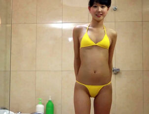 Non-Nude chinese bathing suit damsel model. Ultra-cutie