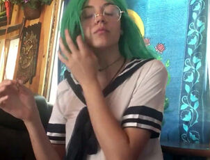 Green haired gf gives smoke lesson bare-chested