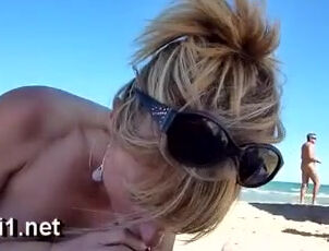 Docile Mummy fellating pecker in the naturist beach flick